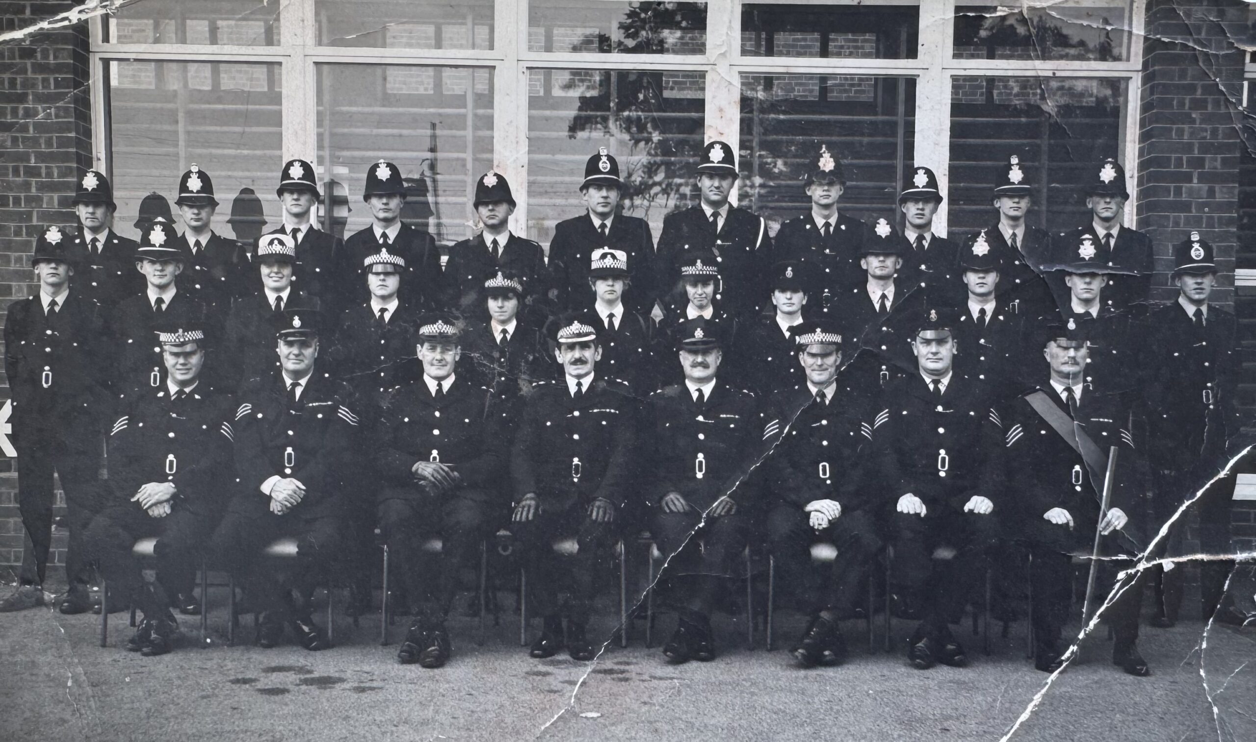 Police officers having a station photo taken